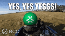 a green ball with a white x on it and the words yes yes yesss above it