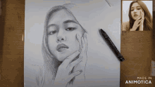 a drawing of a woman 's face is being made by animatica