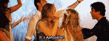 a group of people are dancing in the rain and one of them is saying it 's aphrodite