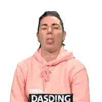 a woman wearing a pink swr dasding hoodie making a funny face