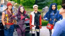 a group of descendants characters standing next to each other with one saying " all laughed you fell "