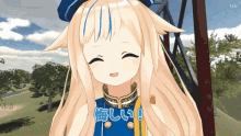 a girl with long blonde hair is smiling and wearing a blue shirt that says ' i love you ' on it
