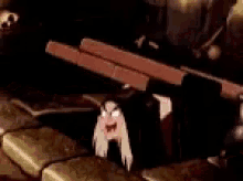 a cartoon character is peeking out of a hole in the ground .