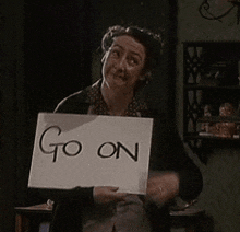 Keep-going Dont-stop GIF - Keep-going Dont-stop Older-woman-with-sign GIFs