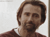 a man with long hair and a beard looks at the camera with a caption that says it 'sscottiesstark
