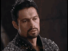 a man with a beard is saying " don 't do this "