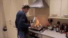 a man is cooking a chess board on a stove