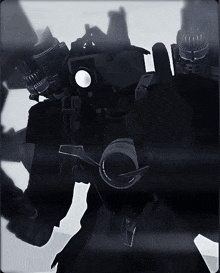a black and white photo of a robot with a lens that says nikon