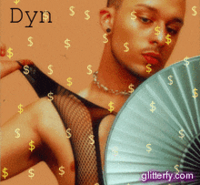 a picture of a man holding a fan with glittery.com written on the bottom