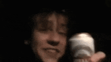 a man is smiling while holding a can of beer that says sierra nevada