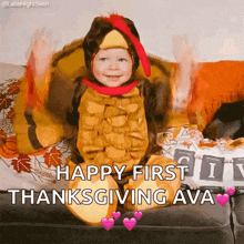 a little boy in a turkey costume is sitting on a couch and says happy first thanksgiving ava