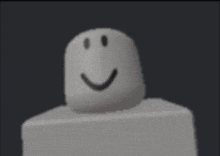 a white block with a smiling face on it .