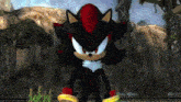 shadow the hedgehog from sonic the hedgehog is standing in front of a mountain .
