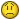 a pixelated smiley face with a sad look on its face .
