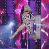 a woman in a bodysuit with a swirl pattern on it