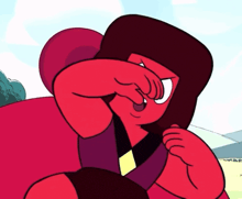 a close up of a cartoon character covering his face with his fist