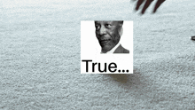 a black and white photo of a man with the word true below him