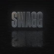 the word swagg that is on a dark surface