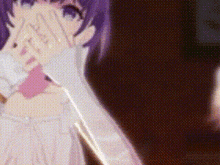 a girl with purple hair is covering her face with her hands .