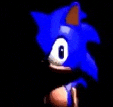 a close up of a blue sonic the hedgehog in the dark .