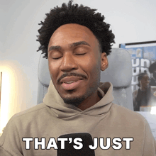 a man in a hoodie says that 's just with his eyes closed