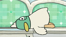 a cartoon duck wearing a green mask is laying on the floor