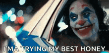 a close up of a clown in a car with the words `` i 'm trying my best honey ''