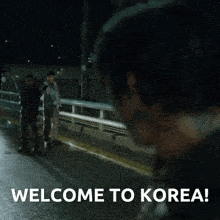 a picture of a man with blood on his face and the words welcome on the bottom