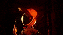 a cartoon character is holding a magnifying glass in front of his face .