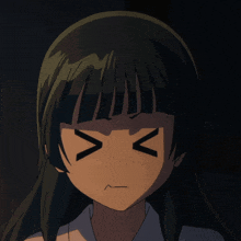 a close up of a girl 's face with a smirk on her face