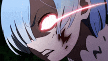 a close up of a person 's eyes with a red light coming out of them