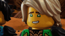 a close up of a lego character with a green eye