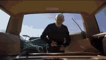 Mike Searching Car Mike Breaking Bad GIF - Mike Searching Car Mike Breaking Bad Mike Better Call Saul GIFs