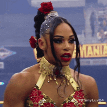 a woman is wearing a gold and red outfit and has the hashtag tiffanyluv24 on her shoulder