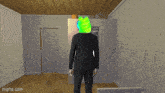 a man in a suit and black shoes is standing on a wooden floor