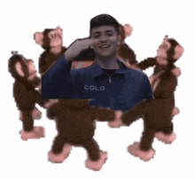 a group of stuffed monkeys dancing around a man