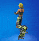 a woman is jumping in the air while riding a skateboard with a graffiti design on it