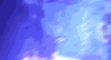 a blue sky with a few clouds floating in it