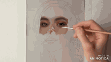 a painting of a woman 's face is being made in animatica