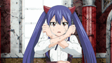 a girl with devil horns is crossing her arms over her chest