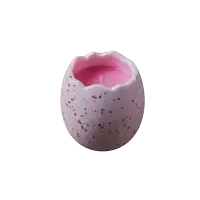 a purple egg with brown spots and a white background