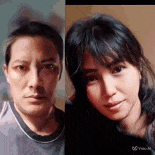 a man and a woman are standing next to each other and the man is wearing a gray shirt