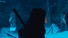 a man and a woman are standing in a snowy area