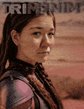 a girl with a braided hair and the word trimbnim on the bottom
