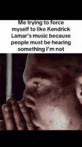 a close up of a man 's face with a caption that says me trying