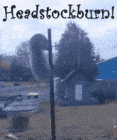 a picture of a bird feeder with the words headstockburn
