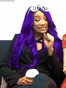 a woman with purple hair is wearing a headband that says hdss