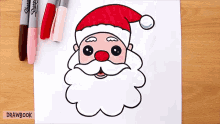 a drawing of santa claus 's face with sharpie markers