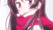 a girl with long brown hair wearing a red scarf around her neck