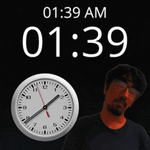 a clock shows the time as 1:39 am